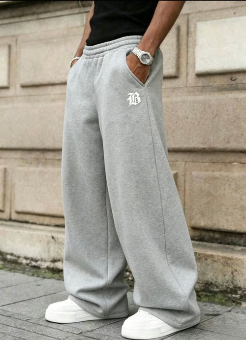Pantalones de chándal casuales de forro polar para hombre, estilo vintage americano, de pierna ancha con efecto drapeado, disponibles en y gris claro, con bolsillos laterales, aptos para uso en casa y al aire libre